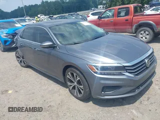 2021 Volkswagen Passat SE with VIN 1VWSA7A30MC000668, listed as a IAAI auction lot 42579785 with 89,305 mi miles and . Bid and sale history available at DreamBid. Image 1.