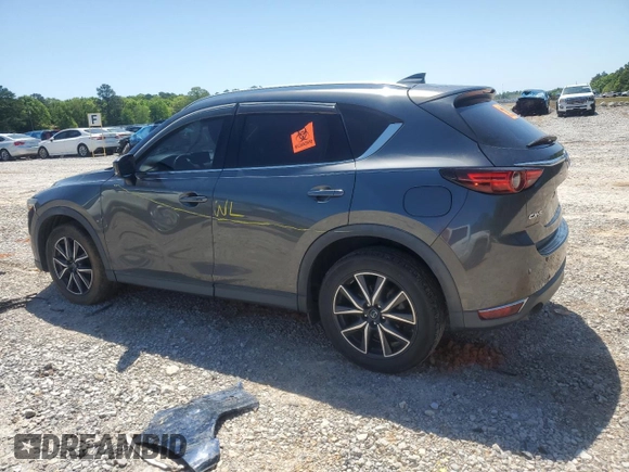 2018 Mazda CX-5 Grand Touring with VIN JM3KFADM9J0343621, listed as a Copart auction lot 52284475 with 129,776 mi miles and Salvage Title. Bid and sale history available at DreamBid. Image 2.