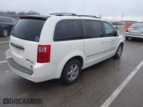 2010 Dodge Grand Caravan SXT with VIN 2D4RN5D1XAR191011, listed as a IAAI auction lot 41162015 with 83,251 mi miles and . Bid and sale history available at DreamBid. Image 4.