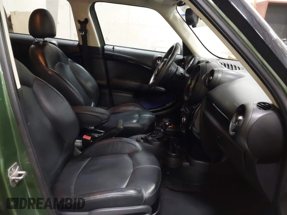 2015 MINI Countryman with VIN WMWZB3C50FWR43714, listed as a IAAI auction lot 41589778 with 93,404 mi miles and . Bid and sale history available at DreamBid. Image 5.