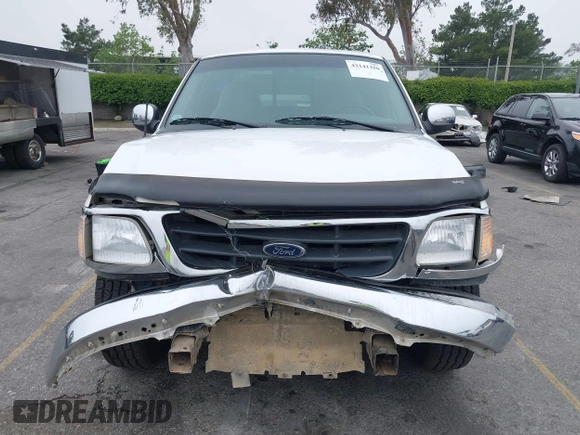 2000 Ford F-150 XL with VIN 1FTRX17L4YNA39407, listed as a IAAI auction lot 42141350 with 82,824 mi miles and . Bid and sale history available at DreamBid. Image 12.