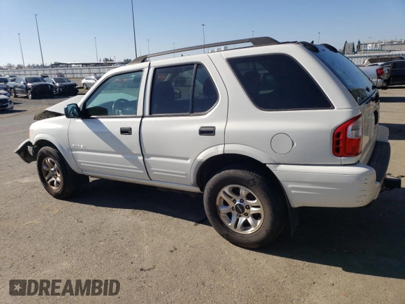 2004 Isuzu Rodeo S z VIN 4S2CK58W044317034, wystawiony jako Copart lot #42401765 z przebiegiem 110 639 mil mil oraz Szkoda całkowita • Salvage title. Historia ofert i sprzedaży dostępna na DreamBid. Obrazek 2.