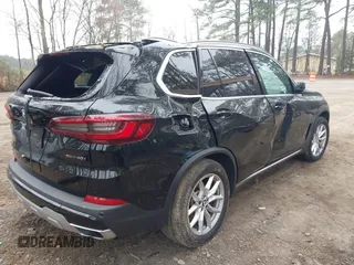 2021 BMW X5 xDrive40i with VIN 5UXCR6C0XM9F35177, listed as a IAAI auction lot 41792661 with 87,547 mi miles and . Bid and sale history available at DreamBid. Image 4.