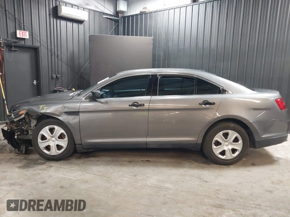 2015 Ford Police Interceptor z VIN 1FAHP2MK4FG119536, wystawiony jako IAAI lot #41635340 z przebiegiem 165 322 mil mil oraz . Historia ofert i sprzedaży dostępna na DreamBid. Obrazek 15.