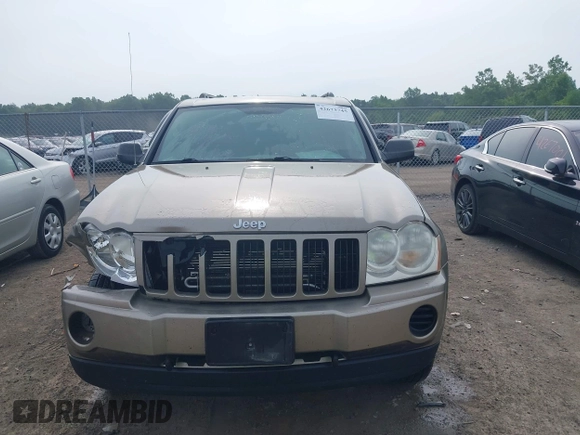 2005 Jeep Grand Cherokee Laredo z VIN 1J4GR48K75C719070, wystawiony jako IAAI lot #42673745 z przebiegiem 181 152 mil mil oraz . Historia ofert i sprzedaży dostępna na DreamBid. Obrazek 12.