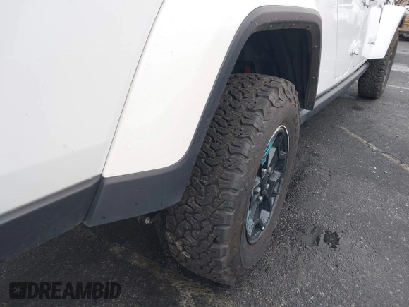 2022 Jeep Gladiator Willys with VIN 1C6HJTAG1NL148524, listed as a IAAI auction lot 41507693 with 42,004 mi miles and . Bid and sale history available at DreamBid. Image 17.