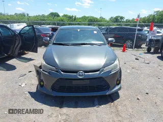 2014 Scion tC z VIN JTKJF5C72E3069389, wystawiony jako IAAI lot #42309410 z przebiegiem 148 494 mil mil oraz . Historia ofert i sprzedaży dostępna na DreamBid. Obrazek 12.