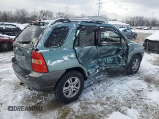 2005 Kia Sportage LX with VIN KNDJF723X57125430, listed as a Copart auction lot 86552714 with Not Provided miles and Salvage Title. Bid and sale history available at carsss.com. Image 3.