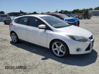 2014 Ford Focus Titanium with VIN 1FADP3N2XEL423320, listed as a Copart auction lot 58709875 with 93,011 mi miles and Salvage title. Bid and sale history available at DreamBid. Image 4.
