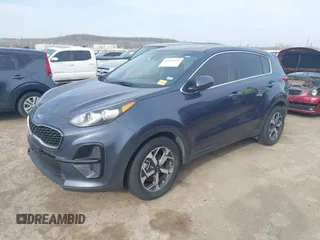 2020 Kia Sportage LX with VIN KNDPM3ACXL7718082, listed as a IAAI auction lot 41821441 with 70,491 mi miles. Bid and sale history available at carsss.com. Image 2.