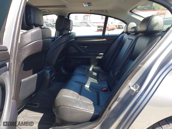 2012 BMW 5 Series 528i with VIN WBAXG5C53CDX03133, listed as a IAAI auction lot 41643009 with 105,360 mi miles. Bid and sale history available at carsss.com. Image 8.
