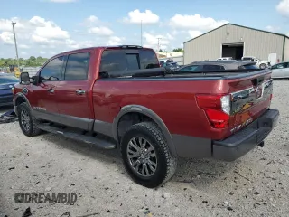 2016 Nissan Titan Pro-4X z VIN 1N6BA1F49GN500013, wystawiony jako Copart lot #67043695 z przebiegiem 93 034 mil mil oraz Nie do naprawy • Non repairable. Historia ofert i sprzedaży dostępna na DreamBid. Obrazek 2.