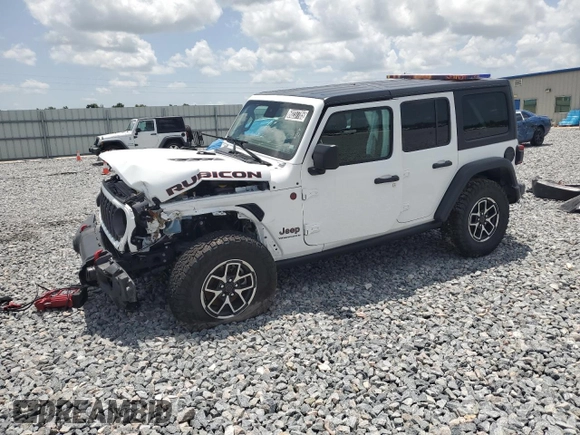 2024 Jeep Wrangler Rubicon z VIN 1C4PJXFG9RW336006, wystawiony jako Copart lot #60237785 z przebiegiem 24 571 mil mil oraz Czysty tytuł • Clean title. Historia ofert i sprzedaży dostępna na DreamBid. Obrazek 1.