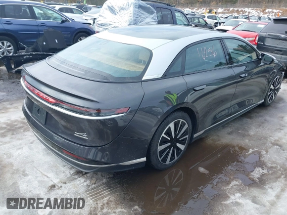 2023 Lucid Air Grand Touring z VIN 50EA1GBA6PA005316, wystawiony jako IAAI lot #41591359 z przebiegiem 4571 mil mil oraz . Historia ofert i sprzedaży dostępna na DreamBid. Obrazek 4.