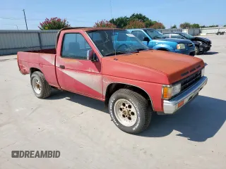 1988 Nissan Hardbody with VIN 1N6ND11S4JC360059, listed as a Copart auction lot 66117965 with 255,043 mi miles and Clean title. Bid and sale history available at DreamBid. Image 4.