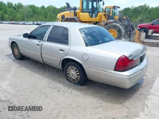 2004 Mercury Grand Marquis LS Premium z VIN 2MEFM75W74X664774, wystawiony jako IAAI lot #42111972 z przebiegiem 273 203 mil mil oraz . Historia ofert i sprzedaży dostępna na DreamBid. Obrazek 3.