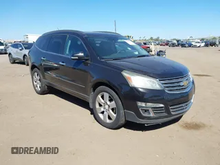 2014 Chevrolet Traverse LTZ z VIN 1GNKVJKD0EJ300825, wystawiony jako IAAI lot #42287675 z przebiegiem 162 599 mil mil oraz . Historia ofert i sprzedaży dostępna na DreamBid. Obrazek 1.