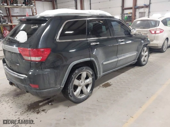 2011 Jeep Grand Cherokee Overland with VIN 1J4RR6GTXBC701186, listed as a IAAI auction lot 41553697 with 172,317 mi miles. Bid and sale history available at carsss.com. Image 4.