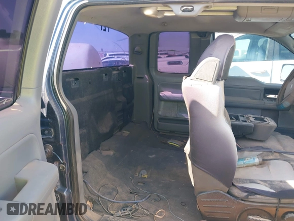 2004 Ford F-150 STX with VIN 1FTRX12W74NA67018, listed as a IAAI auction lot 41978597 with Not provided miles and . Bid and sale history available at DreamBid. Image 8.