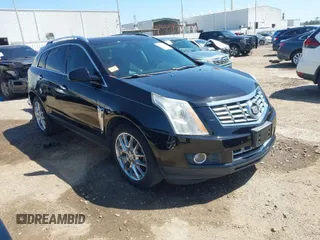 2013 Cadillac SRX Premium Collection z VIN 3GYFNEE39DS624691, wystawiony jako IAAI lot #41949564 z przebiegiem 129 972 mil mil oraz . Historia ofert i sprzedaży dostępna na DreamBid. Obrazek 1.