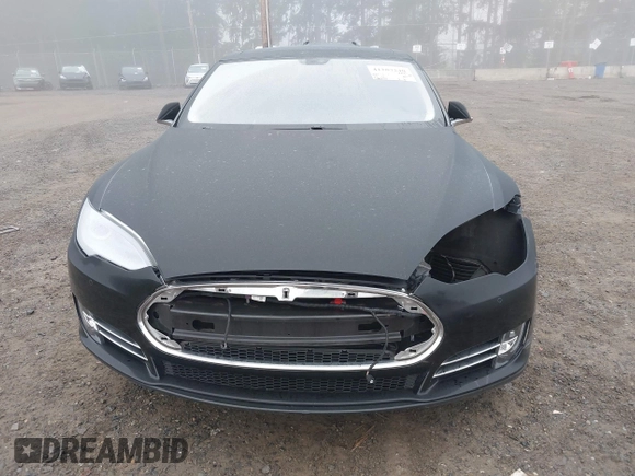 2014 Tesla Model S 60 with VIN 5YJSA1H1XEFP36008, listed as a IAAI auction lot 41287240 with 48,171 mi miles and . Bid and sale history available at DreamBid. Image 13.