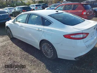 2013 Ford Fusion Titanium with VIN 3FA6P0K90DR248360, listed as a IAAI auction lot 42141987 with 999,999 mi miles. Bid and sale history available at carsss.com. Image 3.