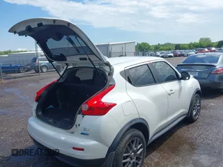 2013 Nissan Juke S with VIN JN8AF5MR4DT210456, listed as a IAAI auction lot 42100893 with 200,380 mi miles. Bid and sale history available at carsss.com. Image 4.