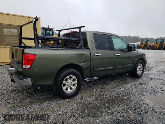 2004 Nissan Titan LE with VIN 1N6AA07A44N524855, listed as a Copart auction lot 73486464 with 322,599 mi miles and Salvage Title. Bid and sale history available at DreamBid. Image 3.