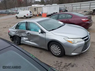 2015 Toyota Camry XLE with VIN 4T4BF1FK1FR458753, listed as a IAAI auction lot 41205010 with 145,771 mi miles. Bid and sale history available at carsss.com. Image 13.