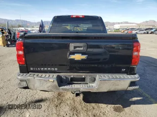 2018 Chevrolet Silverado 1500 LT with VIN 3GCPCREC1JG412907, listed as a Copart auction lot 51138915 with 72,063 mi miles and Salvage Title. Bid and sale history available at DreamBid. Image 6.