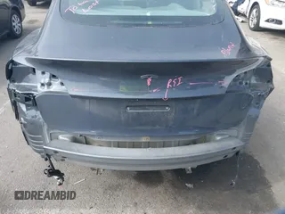 2023 Tesla Model 3 z VIN 5YJ3E1EA0PF577869, wystawiony jako IAAI lot #41468956 z przebiegiem 38 760 mil mil oraz . Historia ofert i sprzedaży dostępna na DreamBid. Obrazek 6.