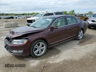 2014 Volkswagen Passat SE z VIN 1VWBN7A39EC104971, wystawiony jako Copart lot #54261965 z przebiegiem 144 388 mil mil oraz Szkoda całkowita • Salvage title. Historia ofert i sprzedaży dostępna na DreamBid. Obrazek 1.