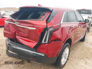 2023 Cadillac XT5 FWD Luxury z VIN 1GYKNAR42PZ147121, wystawiony jako IAAI lot #41315848 z przebiegiem 10 444 mil mil oraz . Historia ofert i sprzedaży dostępna na DreamBid. Obrazek 17.