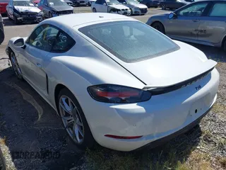 2021 Porsche Cayman with VIN WP0AA2A80MS260426, listed as a IAAI auction lot 41680025 with 19,804 mi miles and . Bid and sale history available at DreamBid. Image 3.