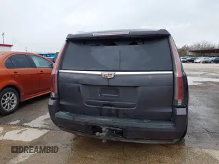 2015 Cadillac Escalade Premium z VIN 1GYS3NKJ5FR540221, wystawiony jako IAAI lot #41289989 z przebiegiem 100 191 mil mil oraz . Historia ofert i sprzedaży dostępna na DreamBid. Obrazek 16.