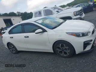 2021 Kia Forte LXS z VIN 3KPF24AD0ME349220, wystawiony jako IAAI lot #42339184 z przebiegiem 84 052 mil mil oraz . Historia ofert i sprzedaży dostępna na DreamBid. Obrazek 13.