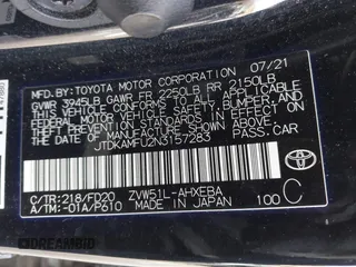 2022 Toyota Prius L Eco with VIN JTDKAMFU2N3157283, listed as a IAAI auction lot 41620334 with 59,754 mi miles. Bid and sale history available at carsss.com. Image 9.