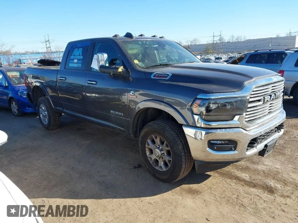 2021 Ram 2500 Laramie z VIN 3C6UR5FL7MG629012, wystawiony jako IAAI lot #41369353 z przebiegiem 168 099 mil mil oraz . Historia ofert i sprzedaży dostępna na DreamBid. Obrazek 1.