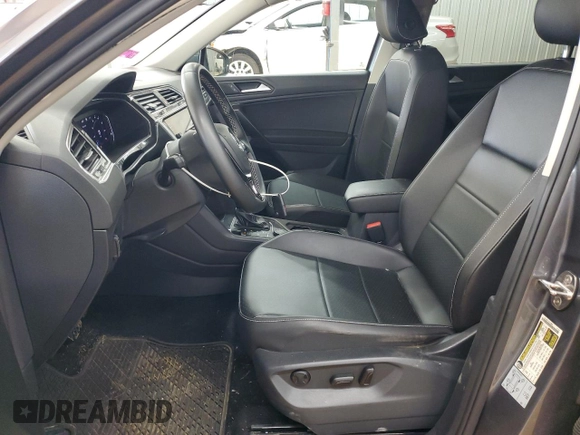 2021 Volkswagen Tiguan SE z VIN 3VV2B7AX6MM086605, wystawiony jako Copart lot #56351285 z przebiegiem 33 460 mil mil oraz Szkoda całkowita • Salvage title. Historia ofert i sprzedaży dostępna na DreamBid. Obrazek 7.