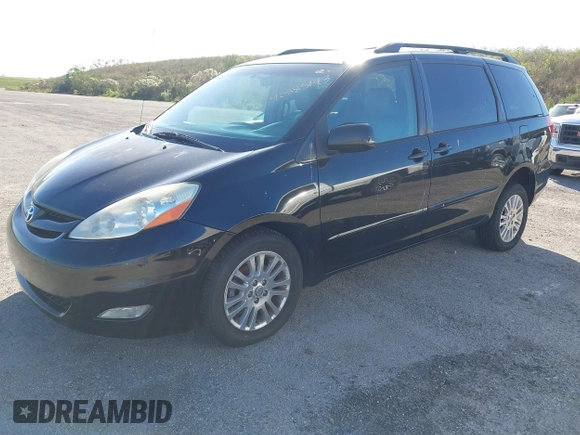 2009 Toyota Sienna XLE with VIN 5TDZK22C59S235573, listed as a IAAI auction lot 40885143 with 62,949 mi miles. Bid and sale history available at carsss.com. Image 2.