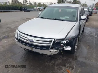 2009 Ford Taurus SEL with VIN 1FAHP24W39G102833, listed as a IAAI auction lot 40892334 with 288,418 mi miles. Bid and sale history available at carsss.com. Image 6.
