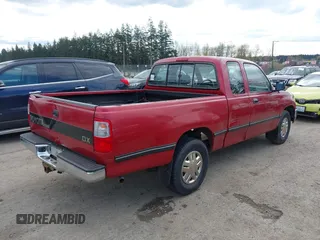 1995 Toyota T100 DX with VIN JT4VD12E6S0005957, listed as a IAAI auction lot 41943578 with 128,489 mi miles. Bid and sale history available at carsss.com. Image 4.