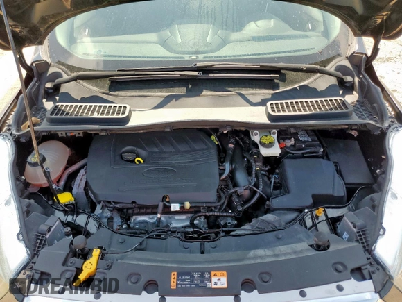 2017 Ford Escape SE z VIN 1FMCU0GD2HUC07371, wystawiony jako Copart lot #59223875 z przebiegiem 26 805 mil mil oraz Szkoda całkowita • Salvage title. Historia ofert i sprzedaży dostępna na DreamBid. Obrazek 12.