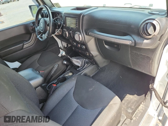 2016 Jeep Wrangler Black Bear with VIN 1C4AJWAG5GL151537, listed as a Copart auction lot 62665455 with 93,537 mi miles and Salvage title. Bid and sale history available at DreamBid. Image 8.
