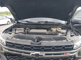 2022 Chevrolet Suburban Z71 with VIN 1GNSKDKD7NR151681, listed as a IAAI auction lot 41991670 with 57,090 mi miles and . Bid and sale history available at DreamBid. Image 10.