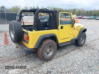 2006 Jeep Wrangler Sport z VIN 1J4FA49S06P700436, wystawiony jako IAAI lot #41866190 z przebiegiem 191 655 mil mil oraz . Historia ofert i sprzedaży dostępna na DreamBid. Obrazek 4.