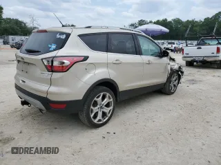 2017 Ford Escape Titanium with VIN 1FMCU0J95HUB96659, listed as a Copart auction lot 54053775 with 69,744 mi miles and Salvage Title. Bid and sale history available at DreamBid. Image 3.