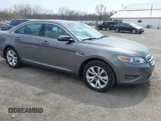 2012 Ford Taurus SEL z VIN 1FAHP2EWXCG138038, wystawiony jako IAAI lot #42007614 z przebiegiem 155 045 mil mil oraz . Historia ofert i sprzedaży dostępna na DreamBid. Obrazek 1.