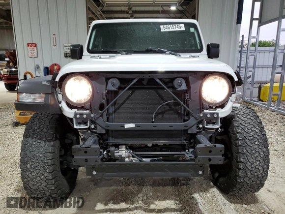 2022 Jeep Wrangler Unlimited Rubicon with VIN 1C4HJXFN8NW129717, listed as a Copart auction lot 54615745 with 33,544 mi miles and Salvage title. Bid and sale history available at DreamBid. Image 5.