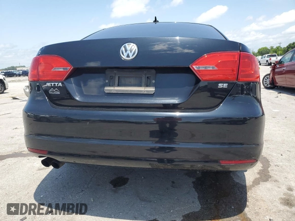 2014 Volkswagen Jetta SE z VIN 3VWD07AJ4EM445862, wystawiony jako Copart lot #61411995 z przebiegiem Nie podano mil oraz Czysty tytuł • Clean title. Historia ofert i sprzedaży dostępna na DreamBid. Obrazek 6.